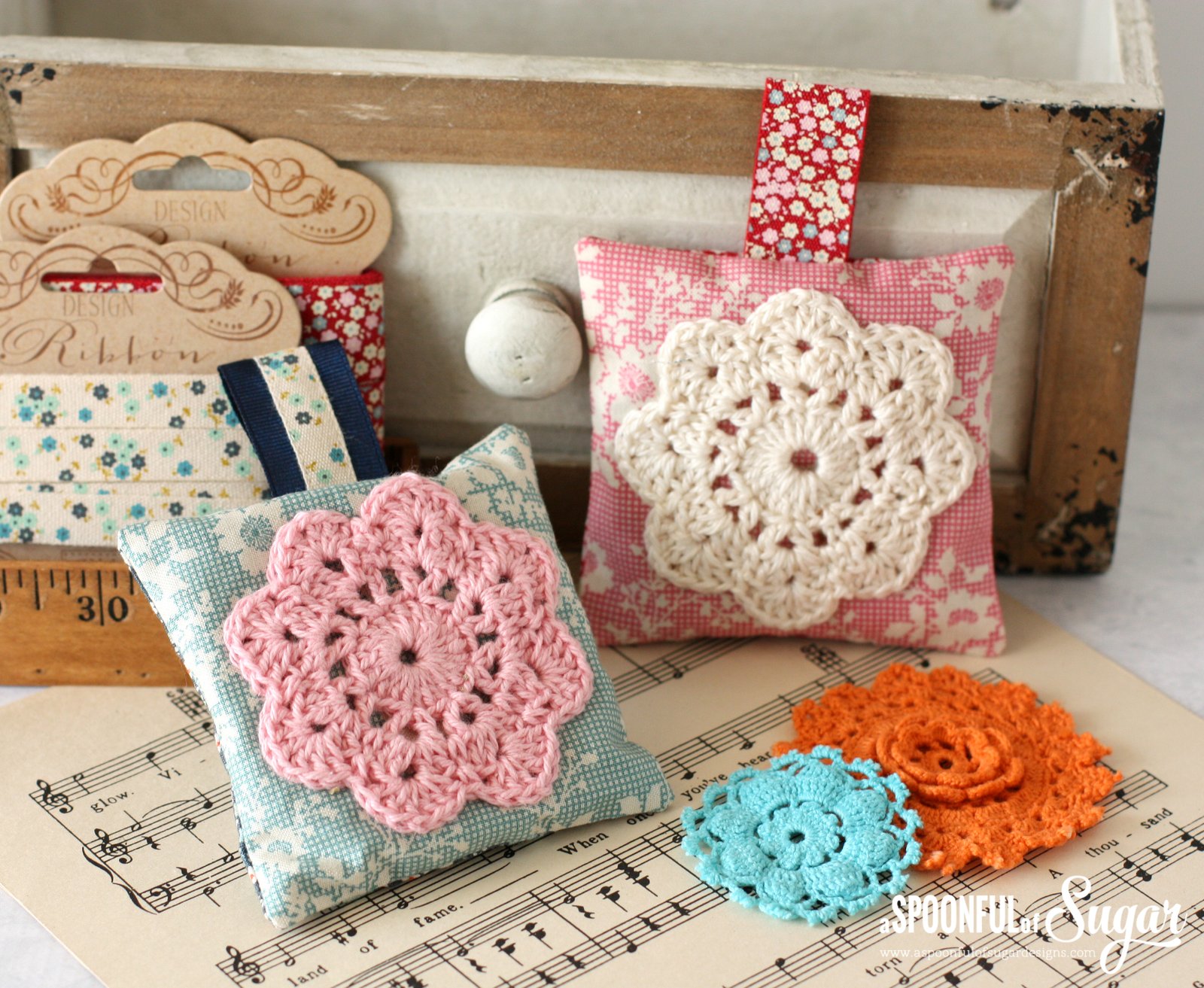 Tutorial for making Lavender Sachets, featuring a crocheted doiley, by A Spoonful of Sugar. 