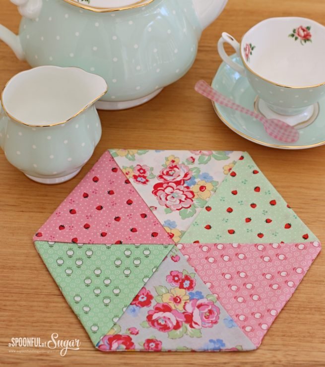 Floral placemat made using the Easy Hexagon Trivet and Coaster pattern by A Spoonful of Sugar. 