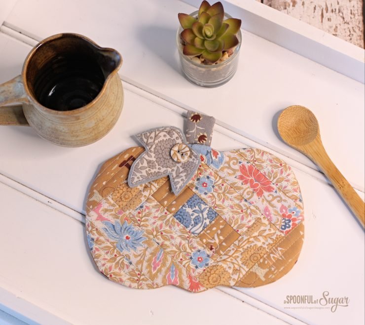 Pumpkin Patchwork Coaster Mug Rug by A Spoonful of Sugar Designs. Pattern available in Pattern Store and in Etsy Shop. Fabric used is Tilda Windy Days.