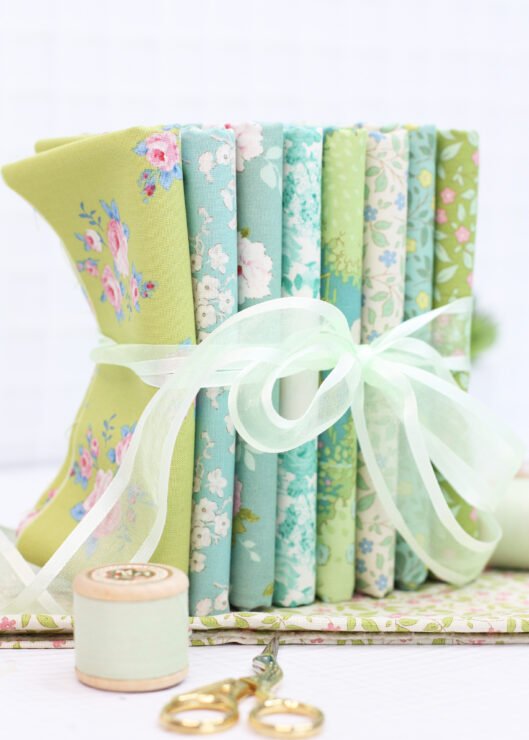 pretty bundle of tilda fabric tied in an organza ribbon