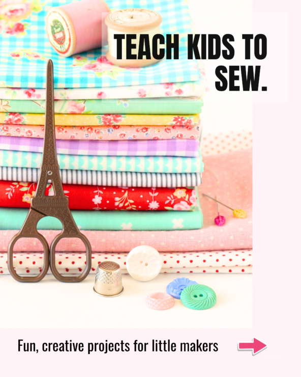 Stack of colourful fabrics with sewing notions including Eiffel Tower scissors, buttons, thread, and thimble, with text ‘Teach Kids to Sew’. Bright, kid‑friendly sewing introduction.