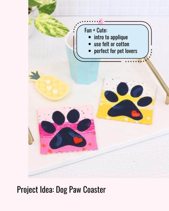 Two square coasters featuring appliqué dog paw prints and hearts in bright colours, styled on a tray with a cup and dish. Beginner‑friendly appliqué project for kids.