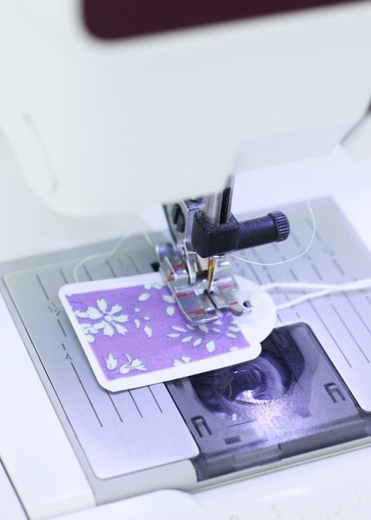 sewing a gift tag