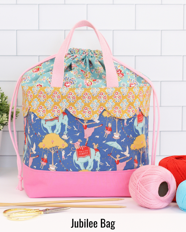 Handmade Jubilee Bag sewn in coordinating fabrics and suitable for carrying sewing projects, books, and everyday essentials.