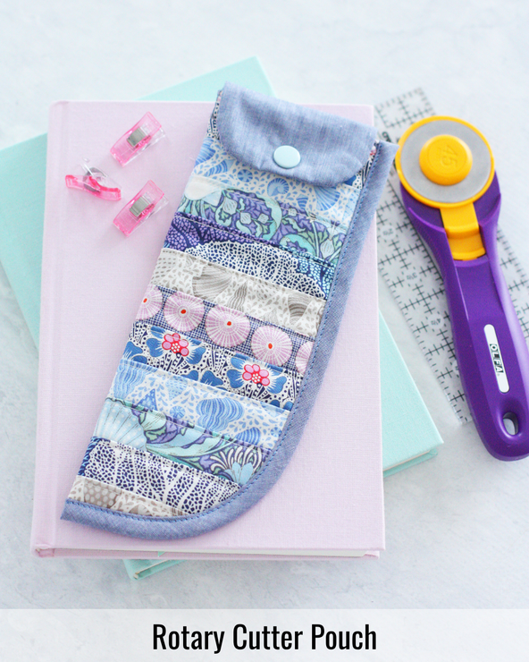 Fabric Rotary Cutter Pouch designed to protect a rotary cutter while keeping sewing tools organized and easy to access.