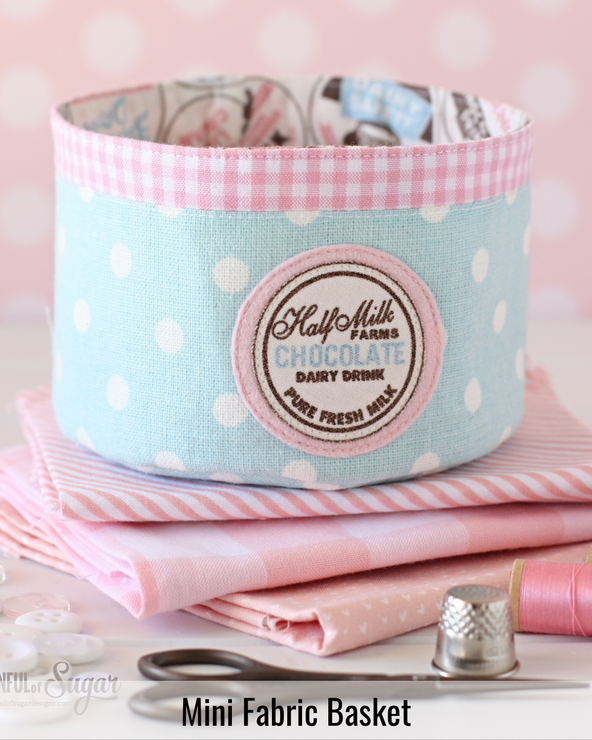 Small quilted fabric basket suitable for storing sewing supplies, clips, thread, and other creative essentials.