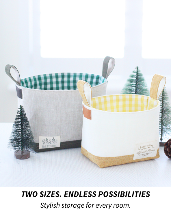 wo Luma Buckets in coordinating Hasting Street Linen displayed together as modern home storage solutions.