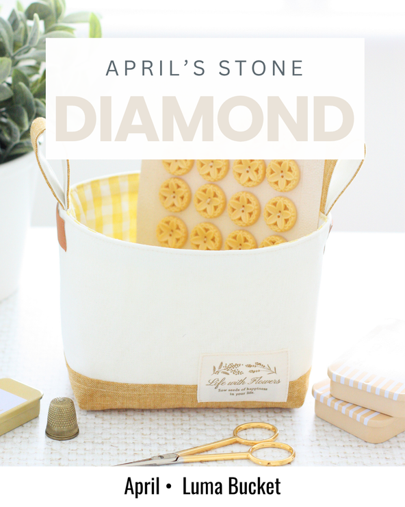 White and gold Luma Bucket sewing project inspired by the diamond birthstone for April