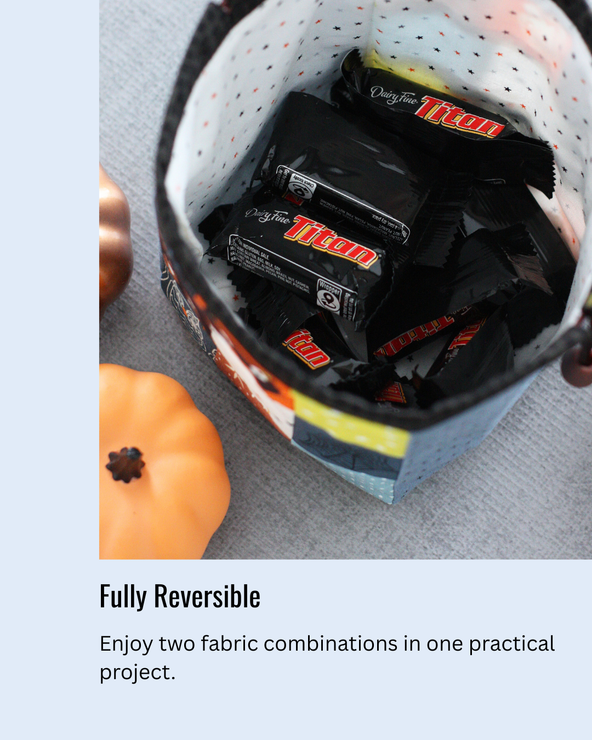 Halloween Handy Drawstring Pouch showing the reversible lining and spacious interior filled with Halloween treats.