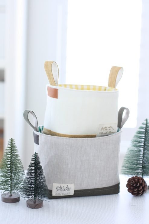 wo fabric Luma Buckets in coordinating Hasting Street Linen, shown together as stylish handmade storage baskets in two sizes.